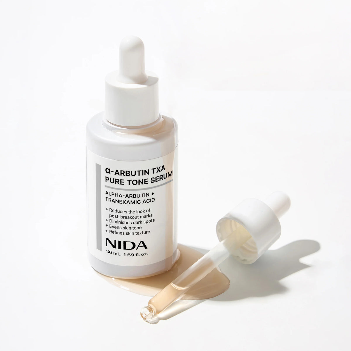 NIDA skaistinantis serumas su alfa-arbutinu ir TXA, 50 ml.