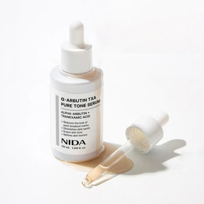 NIDA skaistinantis serumas su alfa-arbutinu ir TXA, 50 ml.